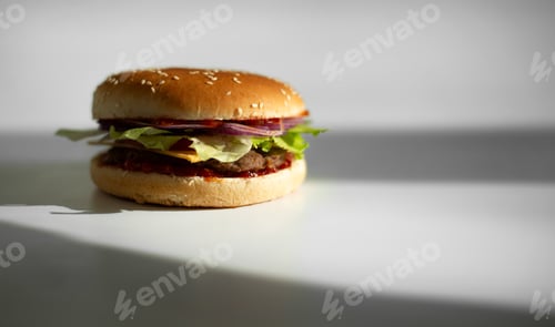Preview: Head on view of a burger on a white background