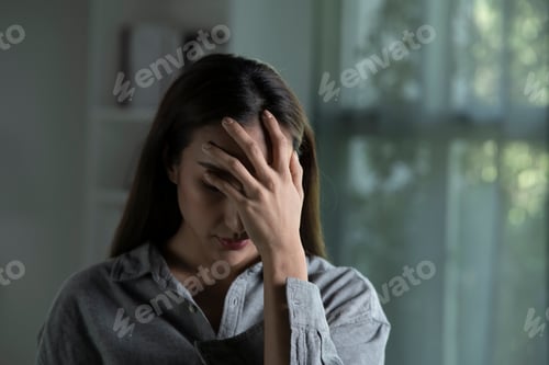 Preview: Sad and worried Asian woman