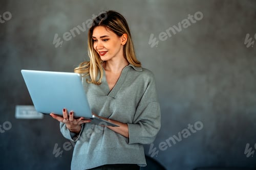 Preview: Technology remote job, lifestyle concept. Success woman with laptop computer working at home office