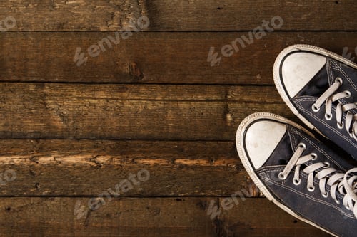 Preview: Gumshoes on wooden background