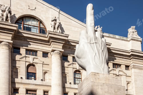 Preview: Contemporary sculpture of a hand making a bold statement against a classic building backdrop.