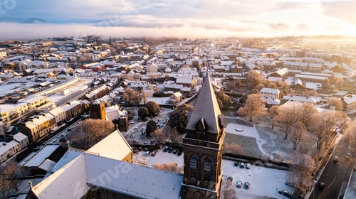 Preview: Aerial view of the Sligo cityscape covered in January snow