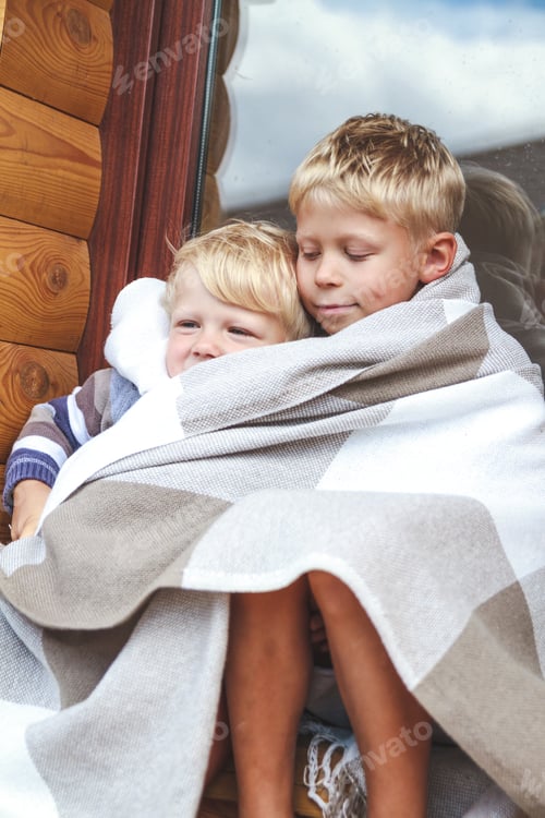 Preview: Two cute little brothers warm themselves together