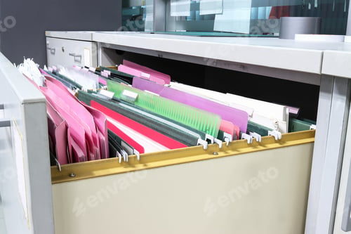 Preview: Files document of hanging file folders in a drawer in a whole pile of full papers, at work office