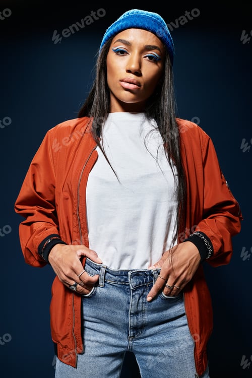 Preview: A young woman showcases stylish autumn fashion with confidence in warm tones and vibrant accessories