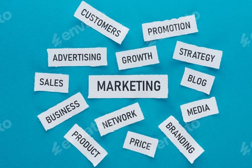 Preview: top view of components of marketing on pieces of paper on blue