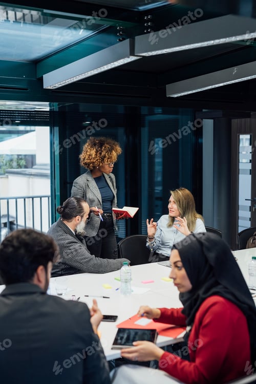 Preview: Business partners at brainstorming meeting in office