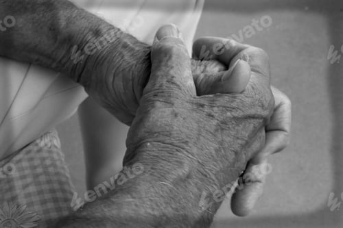 Preview: The clasped hands of an older man, elderly, senior citizen, father, grandfather black and white