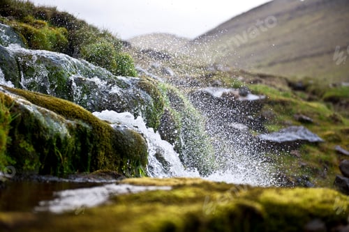 Preview: Splashing water of waterfall on Faroe Islands