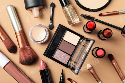 Preview: Different makeup cosmetics on brown background. Female accessories