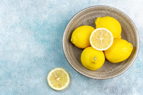 Preview: Fresh lemons on bright background. Lemon fruit citrus. Composition with whole, slices of lemons.