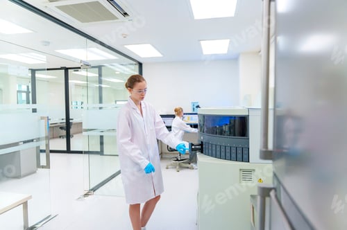 Preview: Laboratory technician conducting analysis in modern research facility