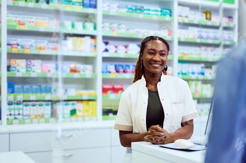 Preview: Smiling Pharmacist Assists Customer in a Clean and Bright Modern Drugstore