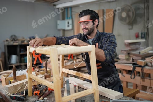 Preview: Carpenters Assembling Furniture
