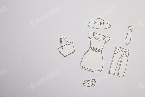 Preview: top view of arranged paper clothes isolated on grey, shopping concept
