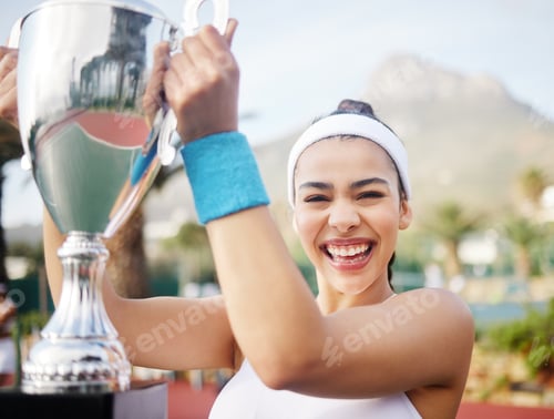 Preview: On and off the court, Im winning. Shot of an attractive young tennis player holding up a trophy.