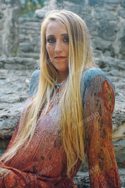 Preview: blonde girl posing in ancient ruins in mexico lifestyle concept