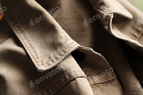 Preview: Close up of brown denim jacket