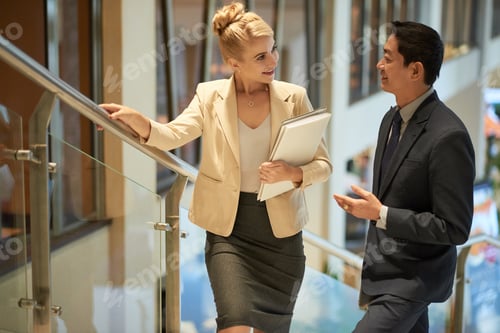 Preview: Talking coworkers on steps