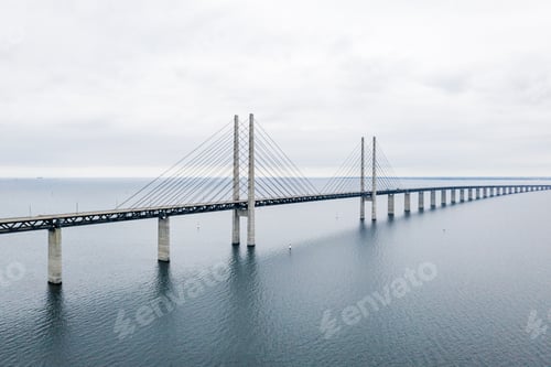 Preview: Oresund Bridge located in Malmo, Sweden on the calm blue water during daylight