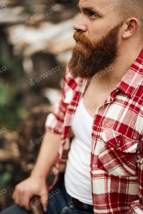 Preview: man hipster with beard on serious face cloth shirt