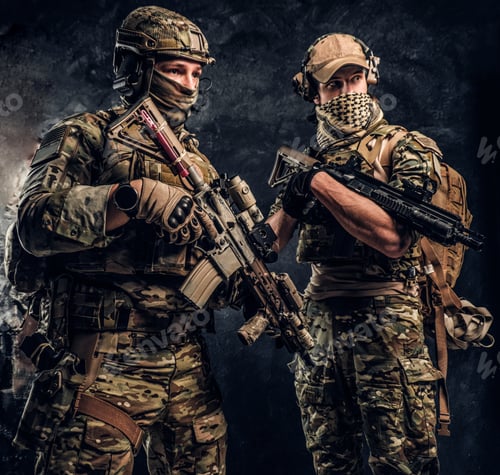 Preview: Two special forces soldiers in full protective equipment with assault rifles