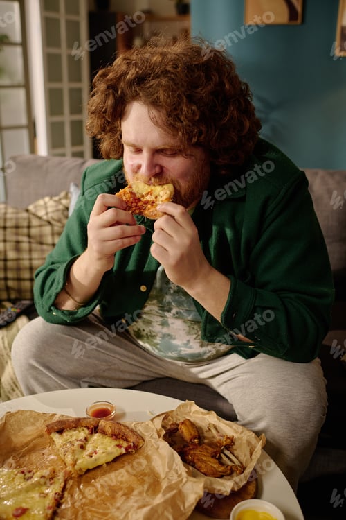 Preview: Enjoying Delicious Bite of Cheesy Pepperoni Pizza