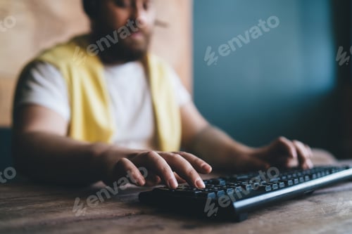 Preview: Unrecognizable man typing on keyboard
