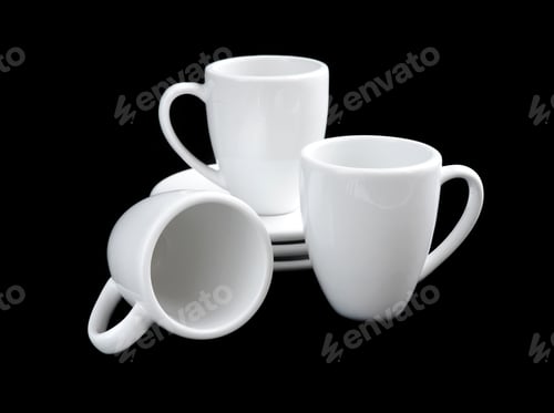 Preview: Empty white coffee cups and saucers on black background