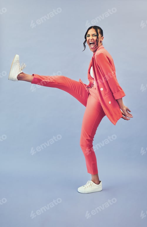 Preview: Business woman, fashion and excited with gen z style with cosmetics and moving in studio. Trendy, s