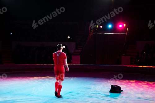 Preview: Acrobat performs a difficult trick in the circus.