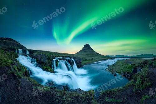 Preview: Panoramic view on Kirkjufellsfoss waterfall under incredible sky