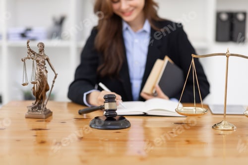 Preview: female lawyers working at the law firms. Judge gavel with scales of justice. Legal law, lawyer,