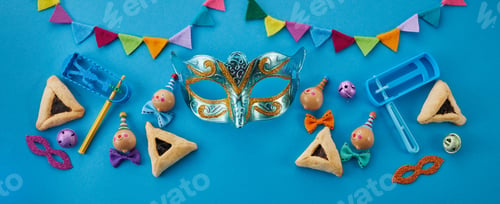 Preview: Purim celebration concept. Jewish carnival background. hamantaschen or hamans ears cookies, carnival