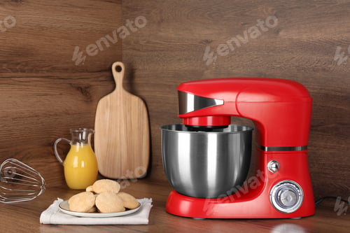 Preview: Composition with modern red stand mixer and different products on wooden table
