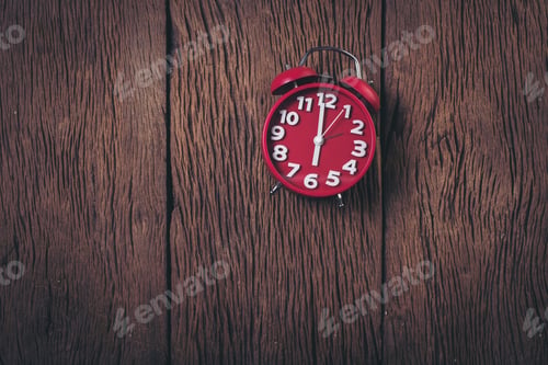 Preview: Top view red alarm clock on wood background