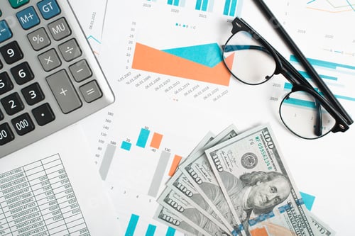 Preview: Financial documents, money, calculator, glasses and pencil on desktop. Business flat lay