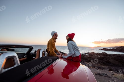 Preview: Lovely couple on the beach, traveling by car