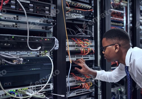 Young Man Working in Data Center