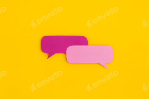 Preview: Paper speech bubbles on a yellow background. Top view with copy space. Flat lay.
