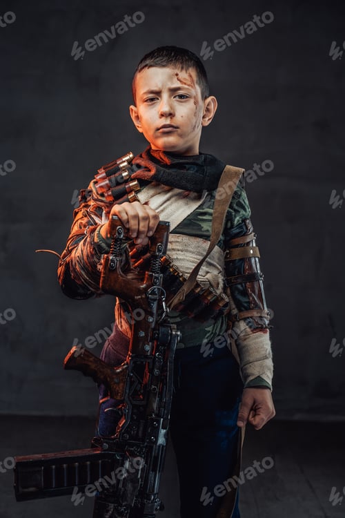 Preview: Young boy in ragged clothing with shotgun in dark background