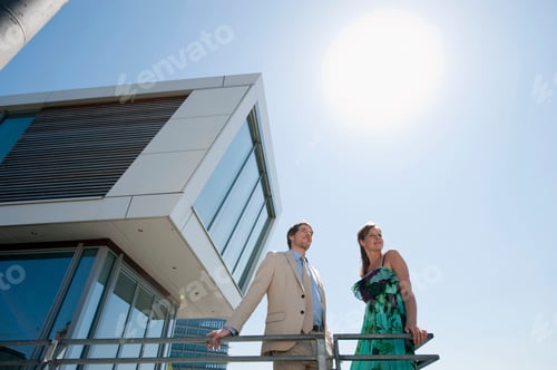 Preview: Germany, Hamburg, Couple on floating home face to face, smiling