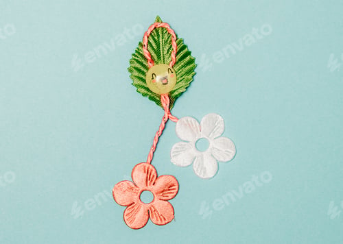 Preview: One beautiful floral martisor on a light blue background.