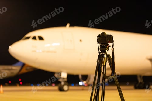 Preview: Camera on tripod during spotting at the airport at night