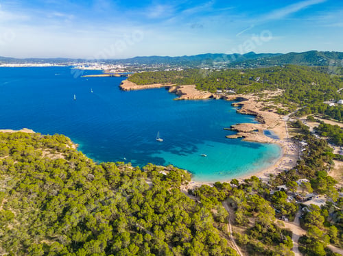 Preview: Ibiza Cala Bassa beach with turquoise water, aerial views