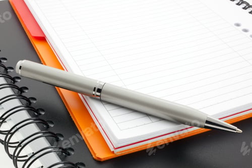 Preview: pen and two paper notebooks