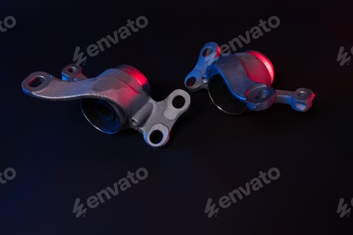 Preview: new car suspension detail, silent block on a black background