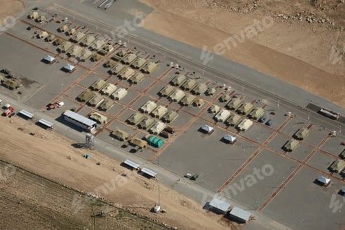 Preview: Overhead aerial shot of a military base in the rocky mountains
