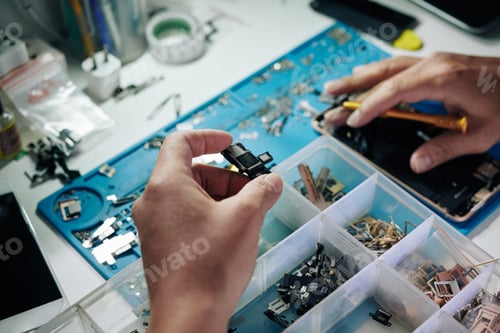 Preview: Repairman searching for working logic board