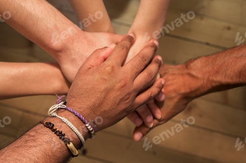 Preview: Group of hands holding together